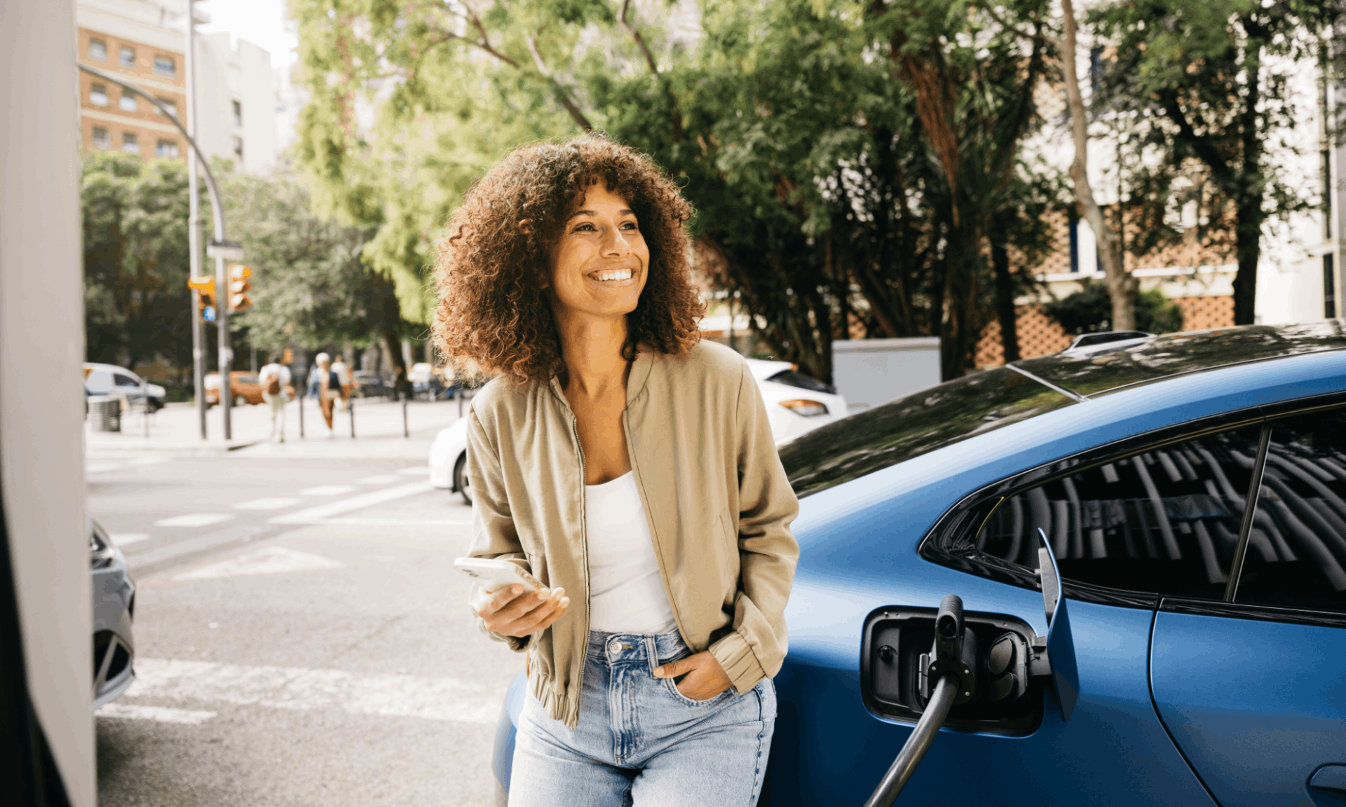 blue electric vehicle on charge