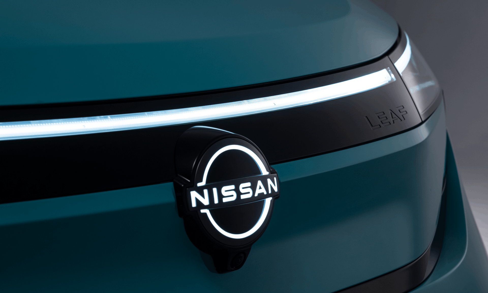 dark close up image of the nissan leaf car
